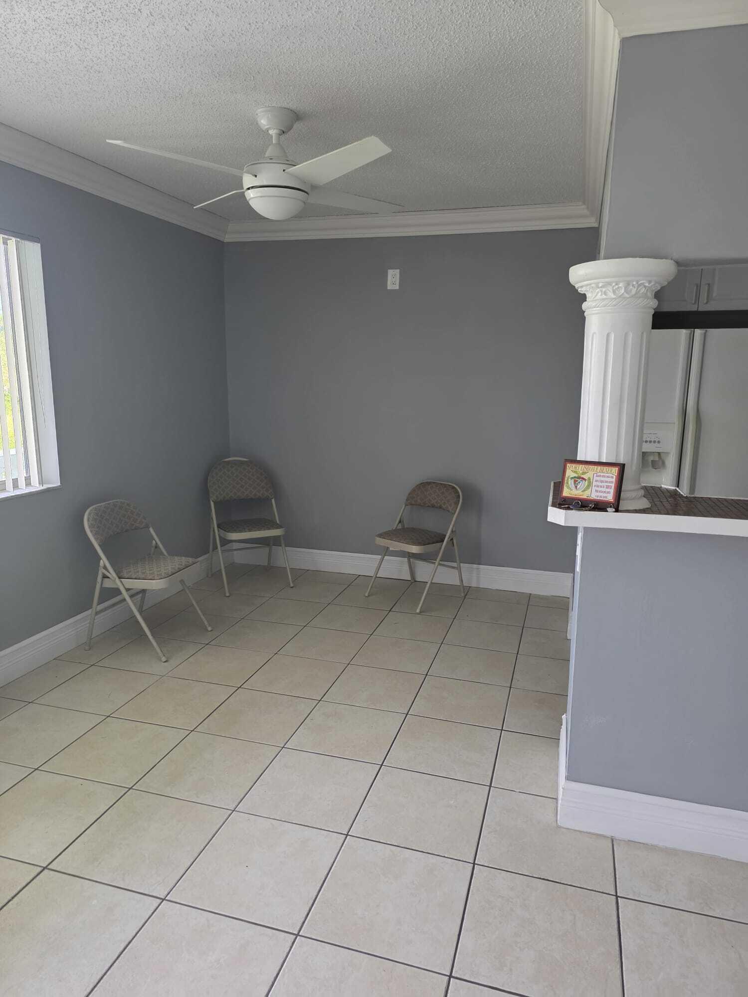 3300 Springdale Boulevard, Unit 318 Palm Springs, FL 33461 - Photo 7 of 34 a view of workspace with furniture