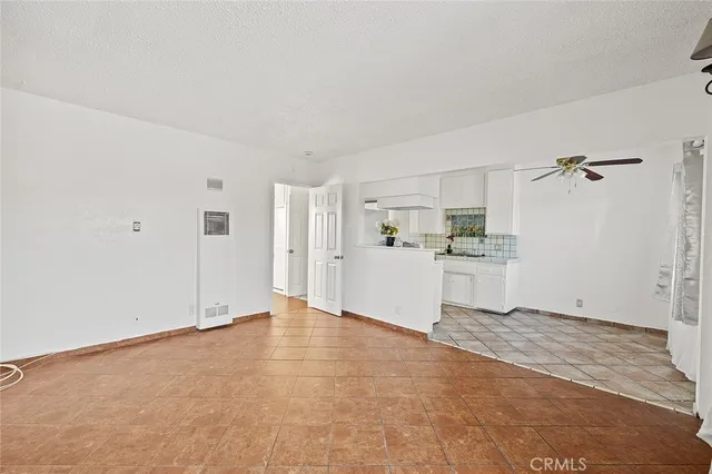 a view of a kitchen with a sink