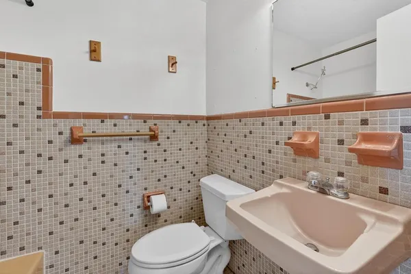 a bathroom with a bathtub and shower
