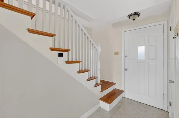 a view of an entryway with staircase