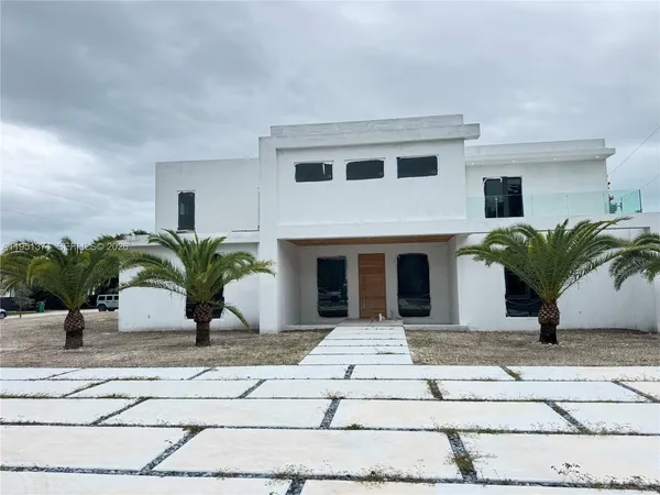 a view of house with yard and outdoor space