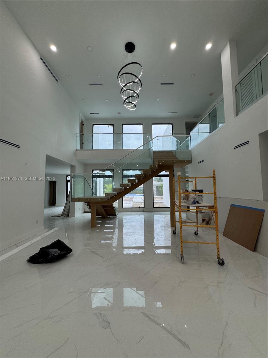 6190 Southwest 128th Street Pinecrest, FL 33156 - Photo 11 of 34 a living room with furniture and furniture