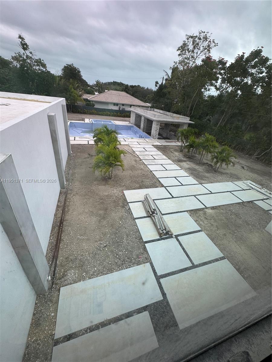 6190 Southwest 128th Street Pinecrest, FL 33156 - Photo 26 of 34 a view of a terrace with sky view