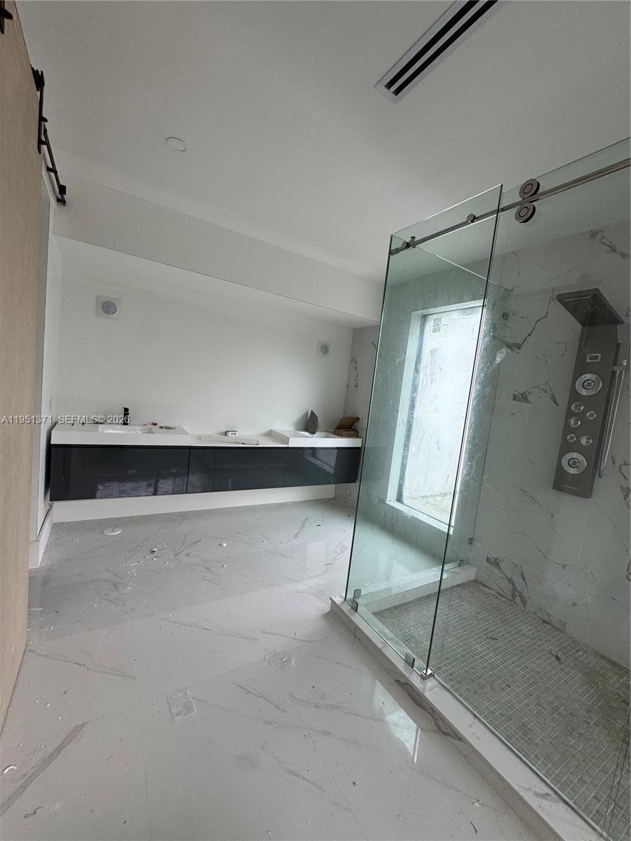 6190 Southwest 128th Street Pinecrest, FL 33156 - Photo 27 of 34 a view of an empty room