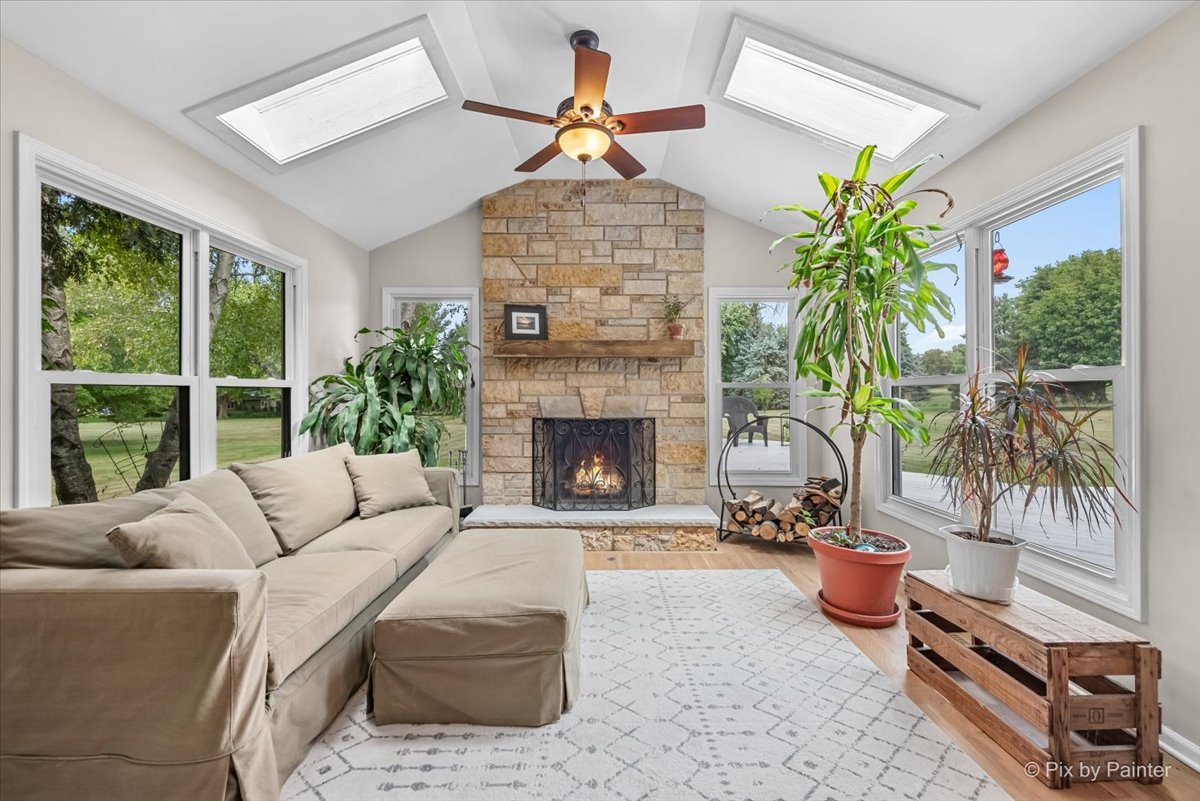 39W278 Baert Road St. Charles, IL 60175 - Photo 15 of 47 a living room with furniture and a fireplace