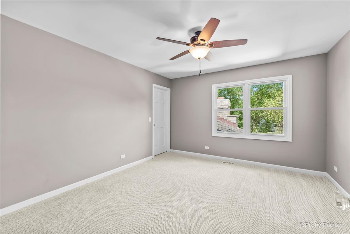 39W278 Baert Road St. Charles, IL 60175 - Photo 24 of 47 a view of an empty room with a window