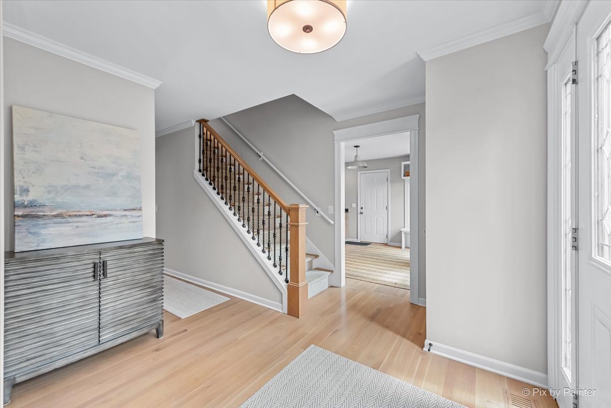 39W278 Baert Road St. Charles, IL 60175 - Photo 3 of 47 a view of entryway and hall with wooden floor