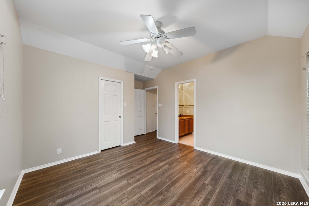 422 Arbor View Adkins, TX 78101 - Photo 19 of 29 a view of an empty room with wooden floor
