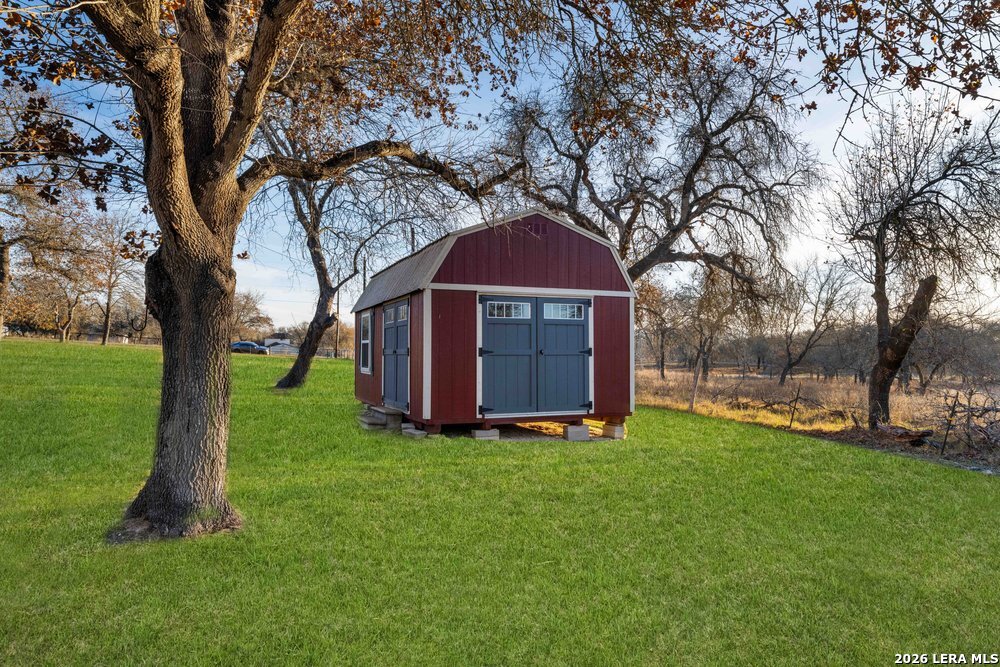422 Arbor View Adkins, TX 78101 - Photo 28 of 29 a view of a house with a yard
