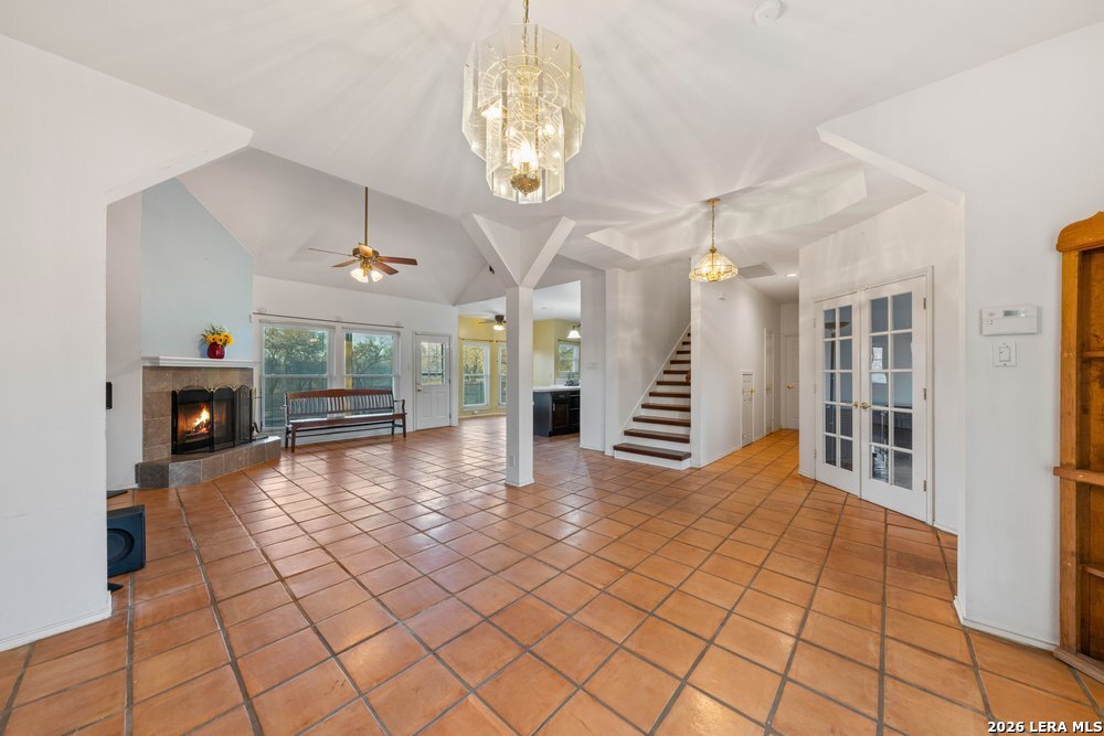 422 Arbor View Adkins, TX 78101 - Photo 8 of 29 a view of an entryway with a chandelier
