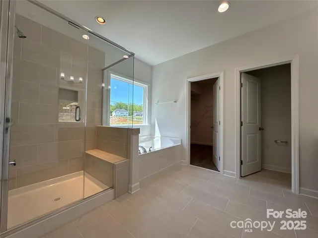 a bathroom with a double vanity sink a and a mirror