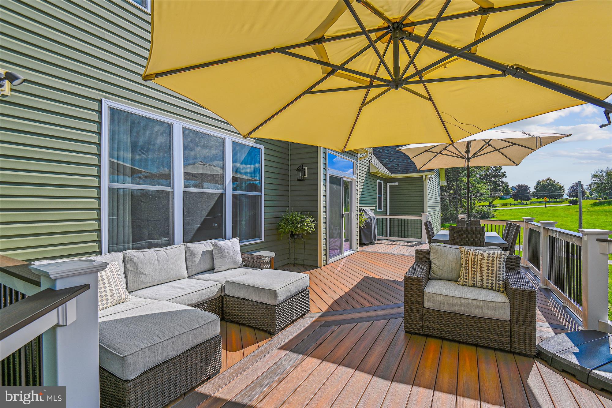 12700 Handboard Road Union Bridge, MD 21791 - Photo 56 of 74 a view of a patio with couches and umbrella