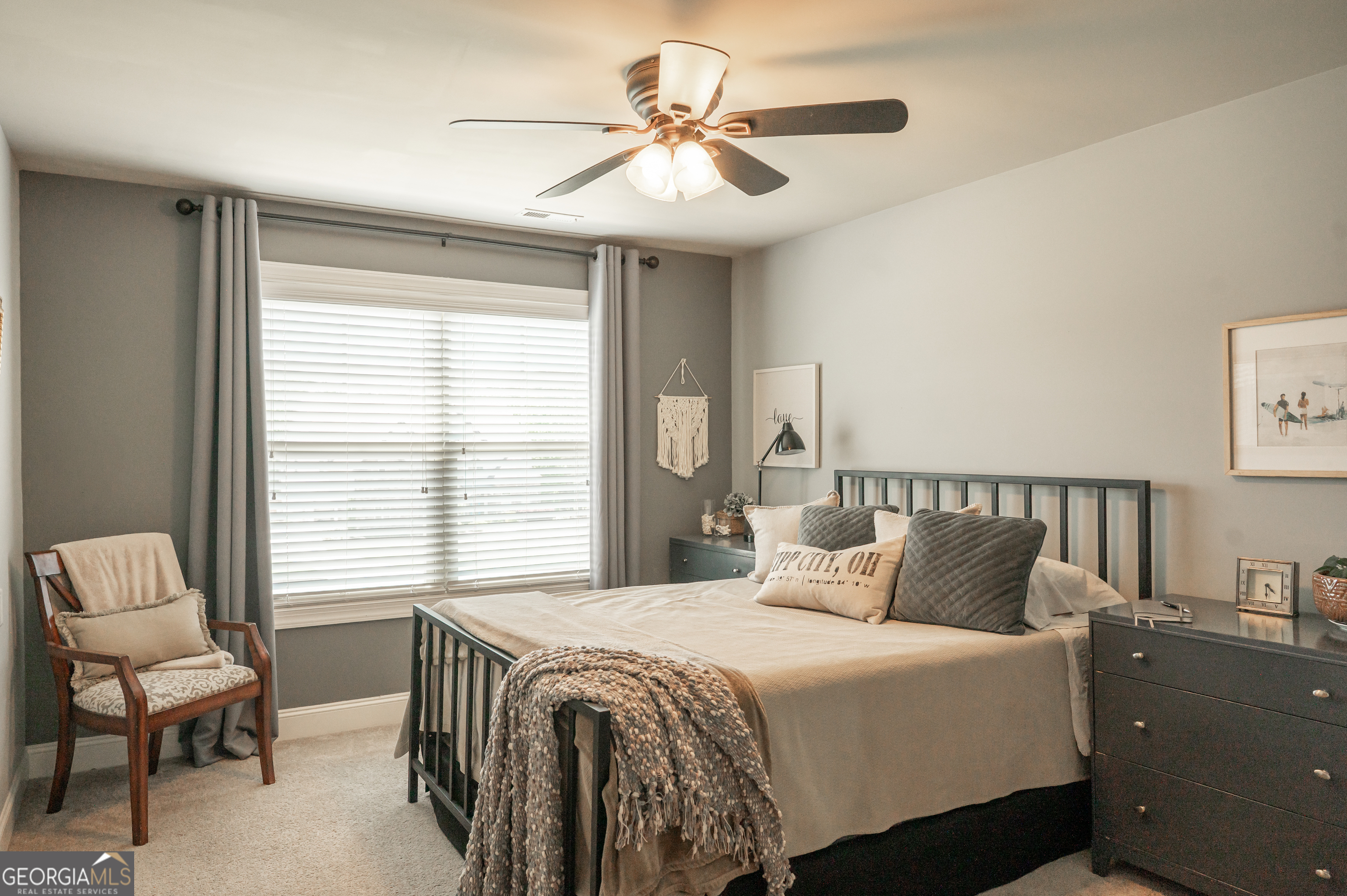 415 EAS Way Fayetteville, GA 30215 - Photo 26 of 70 a bedroom with a bed and a chair