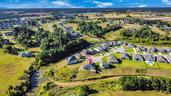 a view of balcony with wooden floor