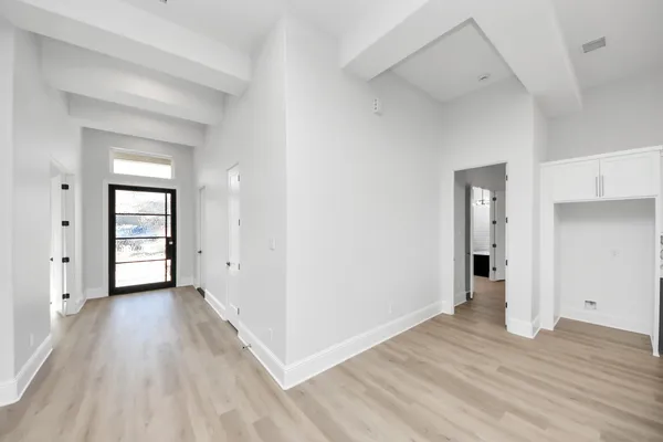 wooden floor & windows in a room