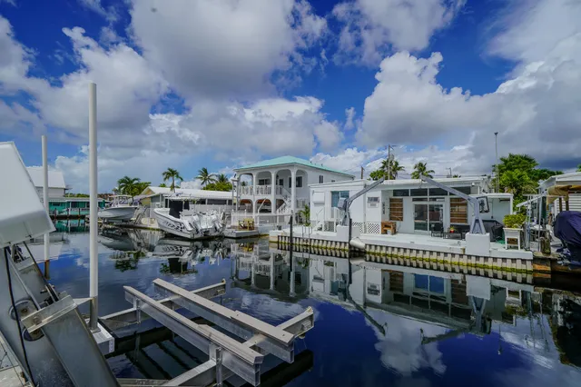 a balcony with furniture and city view