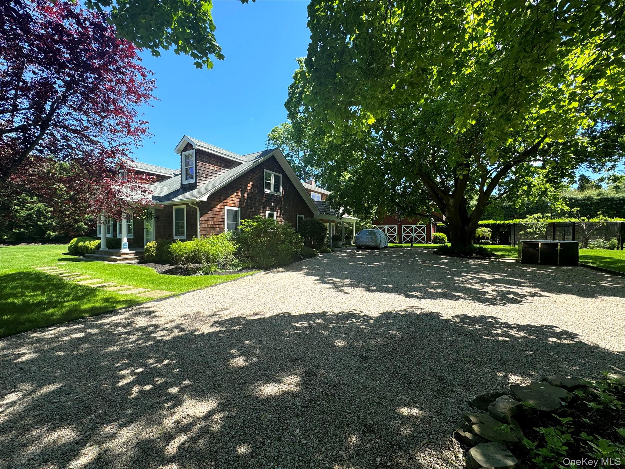 198 South Country Road Remsenburg, NY 11960 - Photo 3 of 46 View of side of home