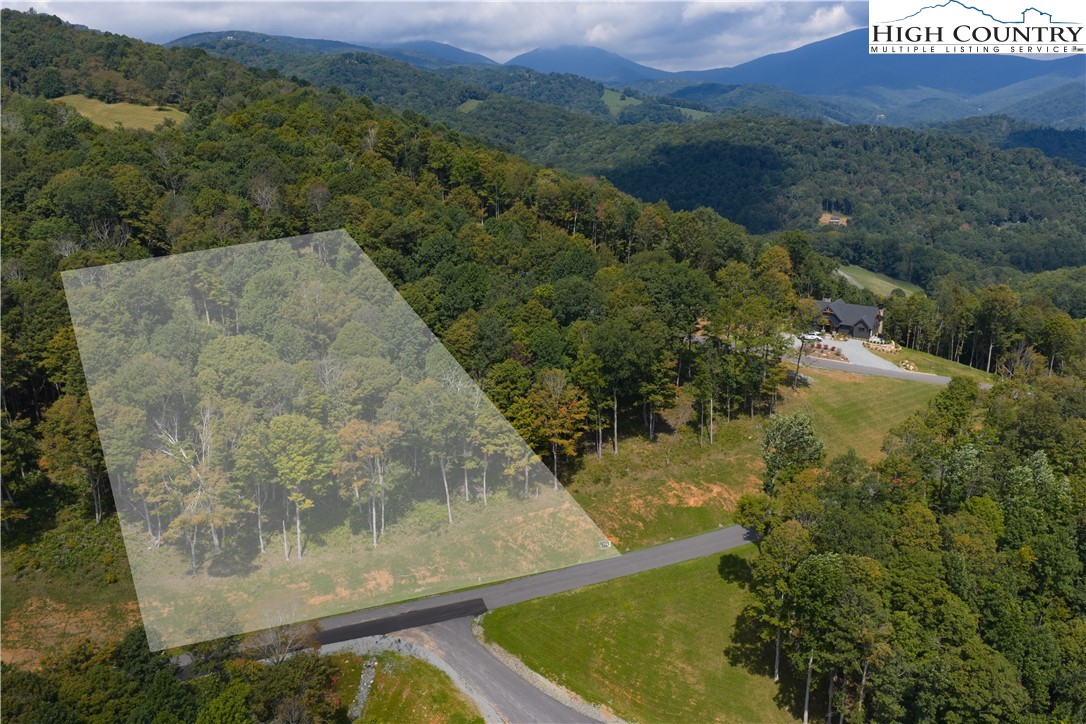 Lot 25 Poplar Forest Drive Boone, NC 28607 - Photo 13 of 25 a view of a wooden bridge