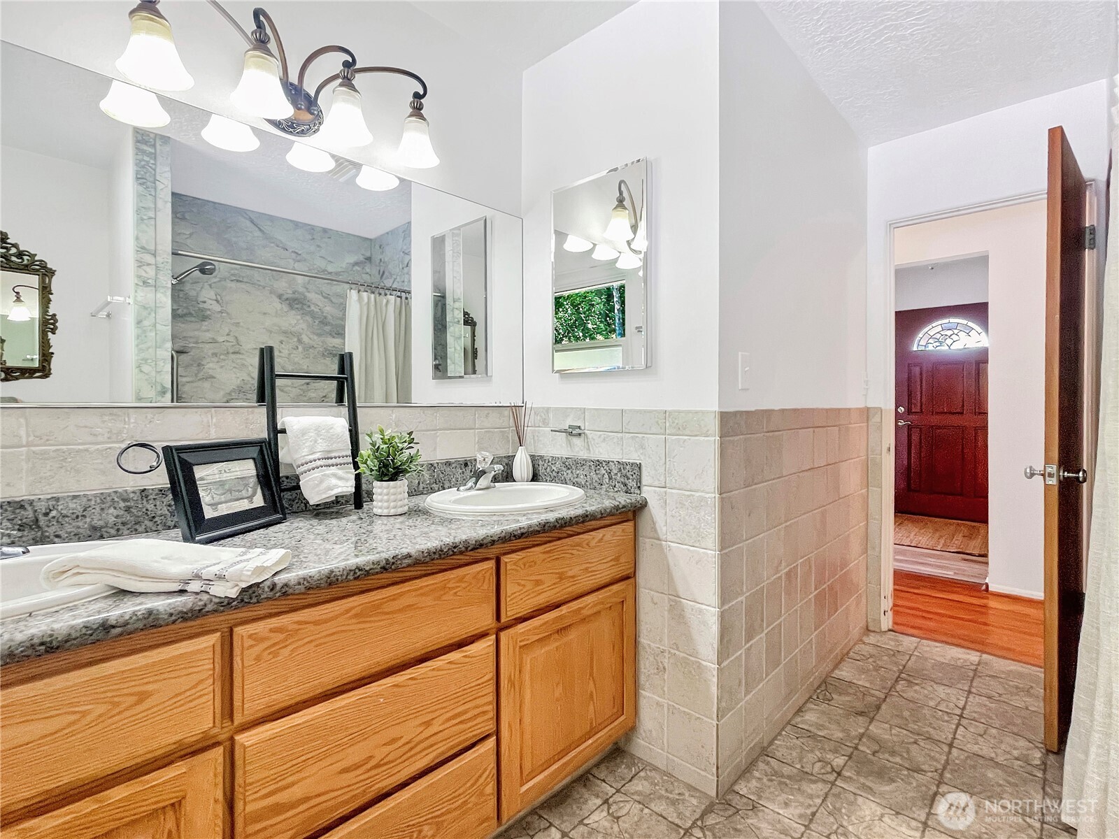 2116 Cascade Way Longview, WA 98632 - Photo 11 of 23 a bathroom with a sink and a mirror