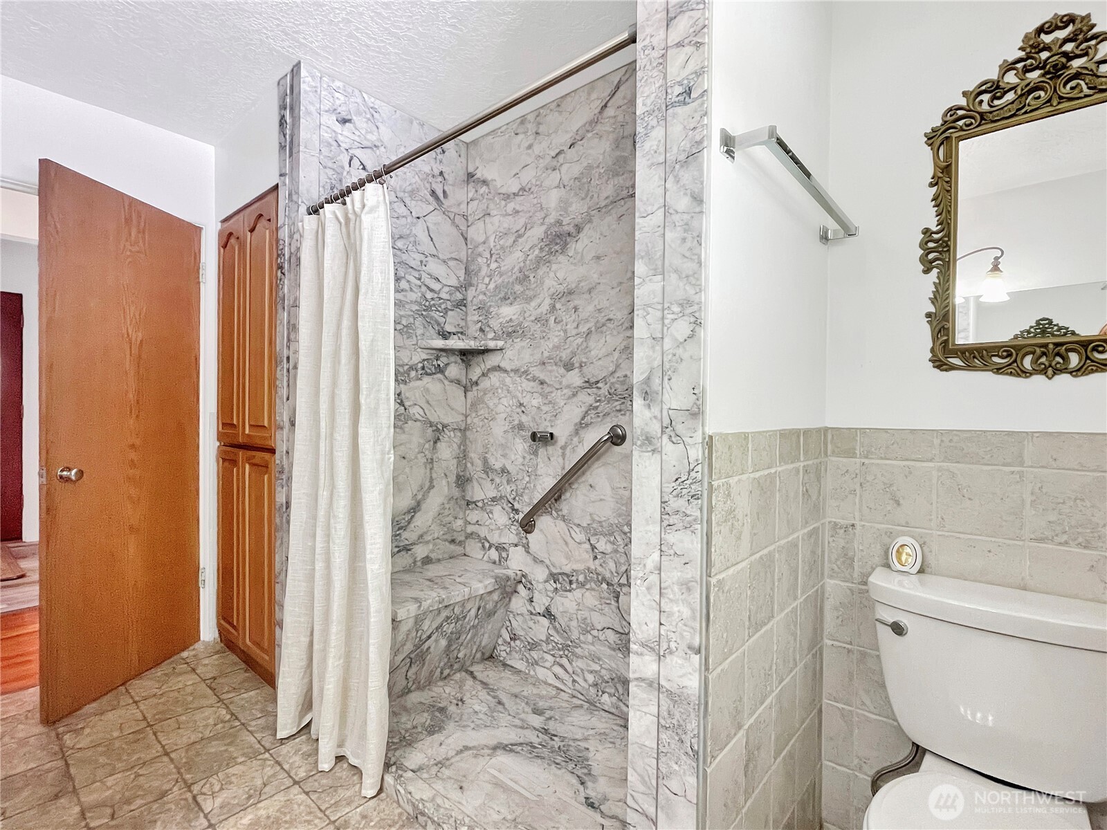 2116 Cascade Way Longview, WA 98632 - Photo 12 of 23 a bathroom with a toilet and shower