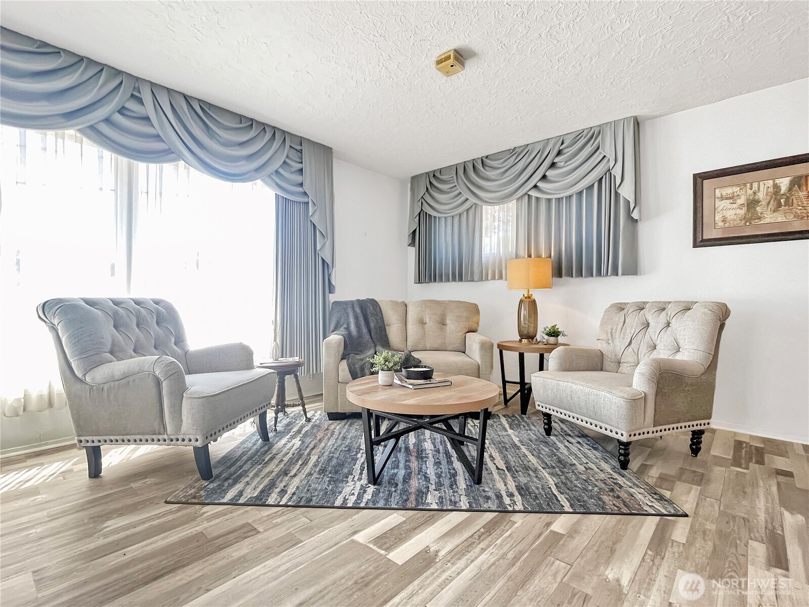 2116 Cascade Way Longview, WA 98632 - Photo 4 of 23 a living room with furniture and a large window