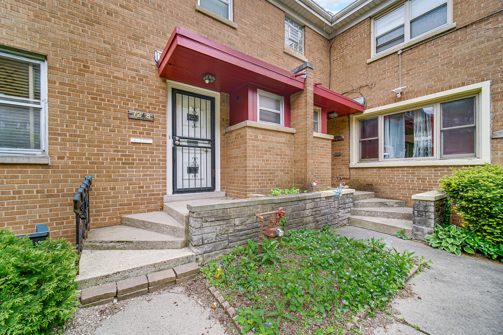 7248 North Ridge Boulevard Chicago, IL 60645 - Photo 1 of 1 a front view of a house