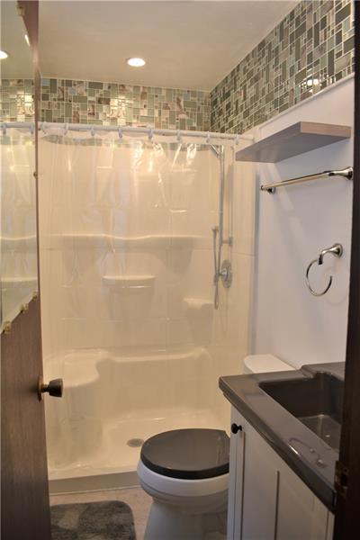 691 Bucktown Road Irwin, PA 15642 - Photo 17 of 23 Full bathroom with walk in shower located in master bedroom.