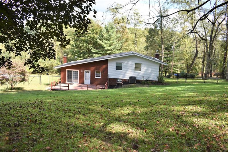 691 Bucktown Road Irwin, PA 15642 - Photo 21 of 23 Back view of home shows 1.5 acre lot.