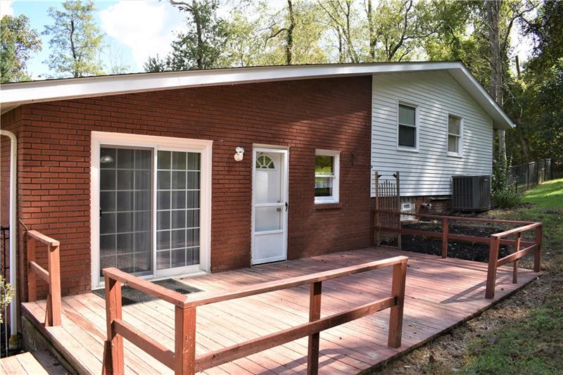 691 Bucktown Road Irwin, PA 15642 - Photo 23 of 23 Back deck off kitchen (level entry) perfect for entertaining, barbeques, and picnics.