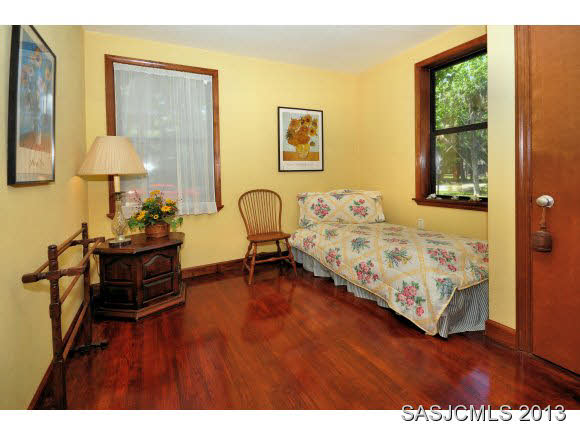 73 Magnolia Avenue St. Augustine, FL 32084 - Photo 14 of 22 a bedroom with bed and a window