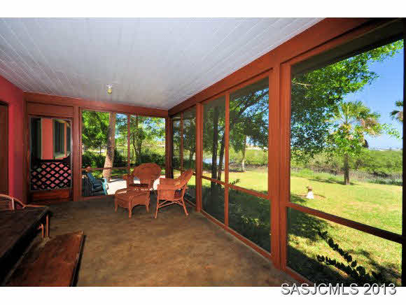 73 Magnolia Avenue St. Augustine, FL 32084 - Photo 15 of 22 a outdoor living space with furniture and garden view