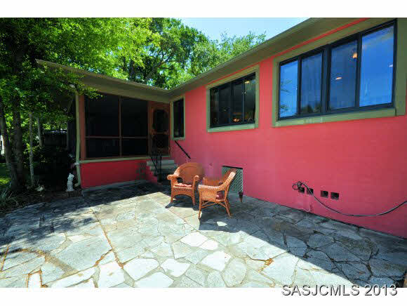 73 Magnolia Avenue St. Augustine, FL 32084 - Photo 16 of 22 a backyard of a house with outdoor seating