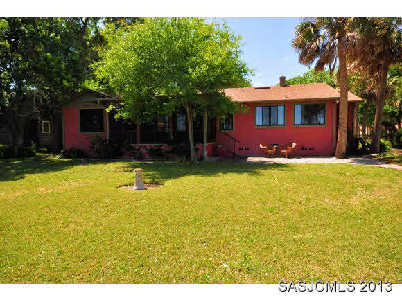 73 Magnolia Avenue St. Augustine, FL 32084 - Photo 18 of 22 a view of a house with swimming pool next to a yard