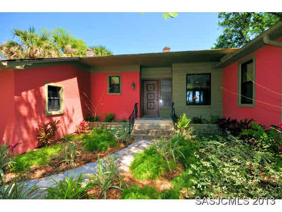 73 Magnolia Avenue St. Augustine, FL 32084 - Photo 2 of 22 a front view of a house with a yard