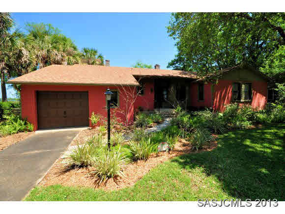 73 Magnolia Avenue St. Augustine, FL 32084 - Photo 22 of 22 a front view of a house with a yard
