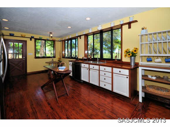 73 Magnolia Avenue St. Augustine, FL 32084 - Photo 7 of 22 a living room with furniture and a large window