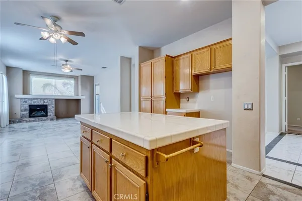 a view of a kitchen with a sink and a window