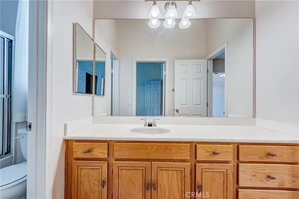 a bathroom with a sink and mirror