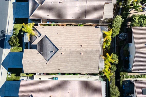 an aerial view of a house with a garden