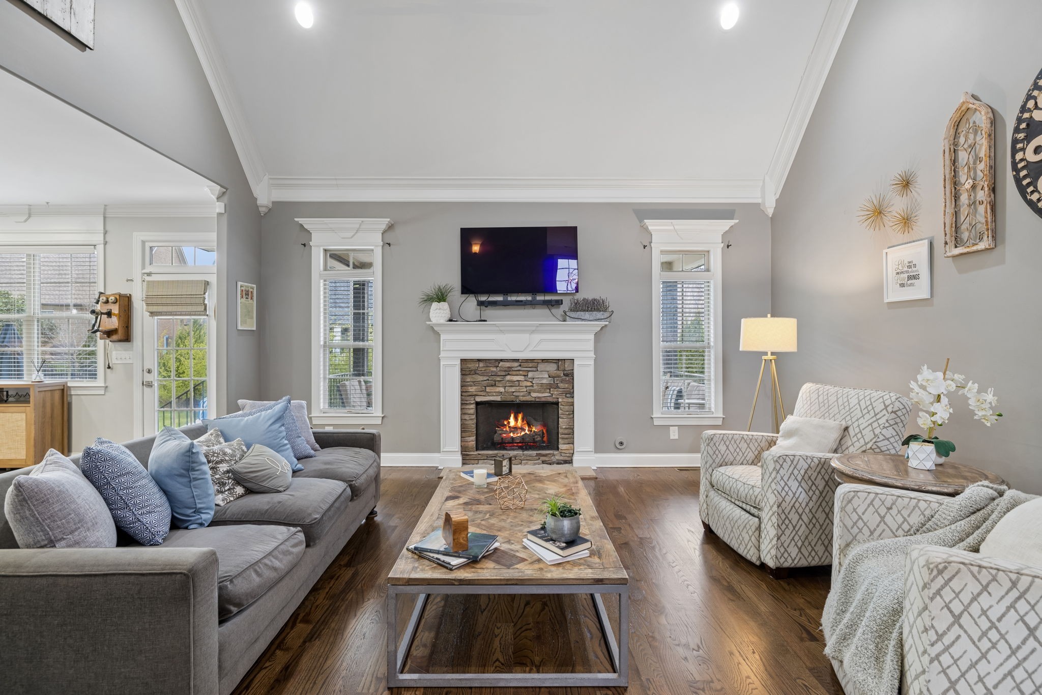 7005 Salmon Run Spring Hill, TN 37174 - Photo 18 of 85 a living room with furniture and a fireplace