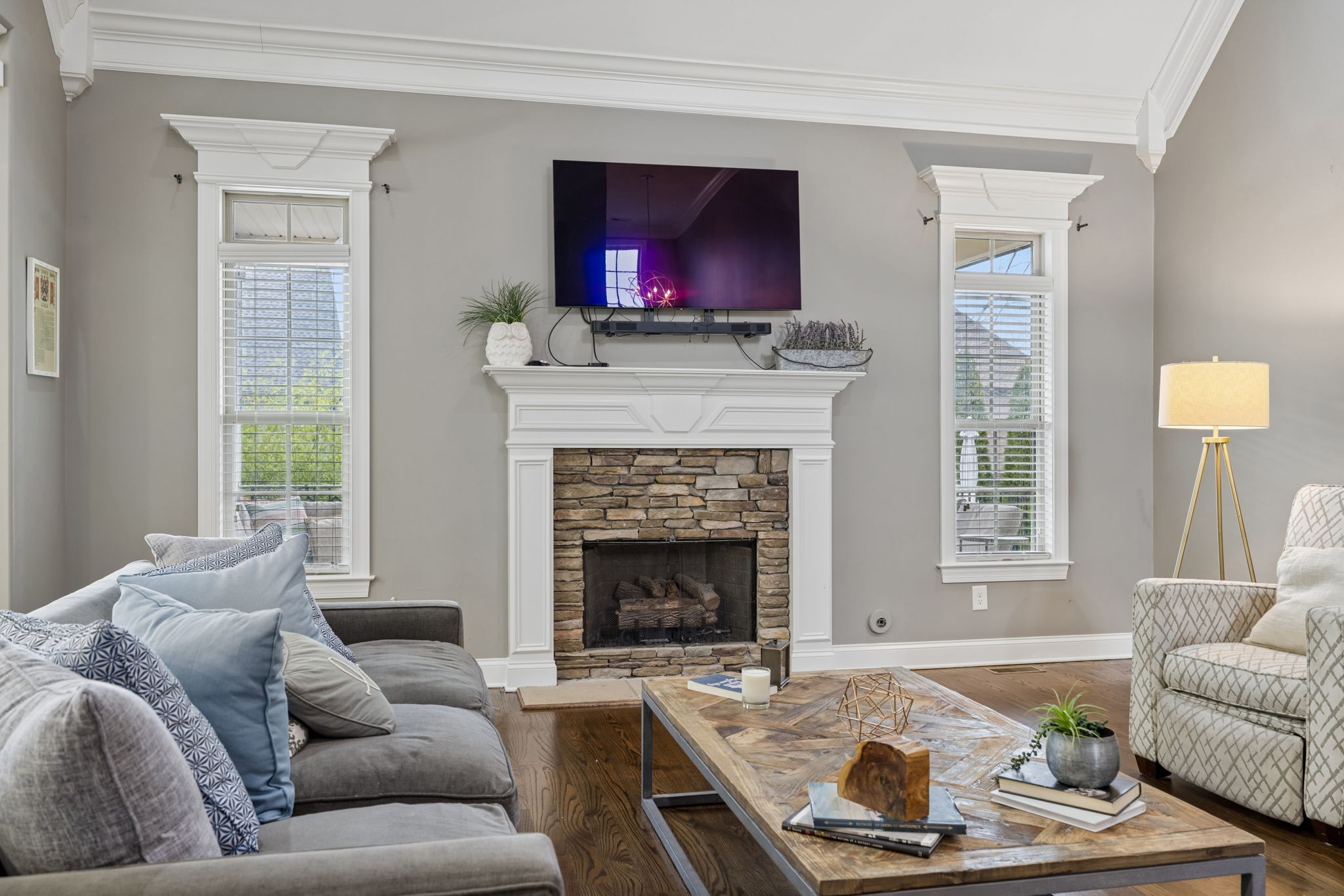 7005 Salmon Run Spring Hill, TN 37174 - Photo 19 of 85 a living room with furniture and a fireplace