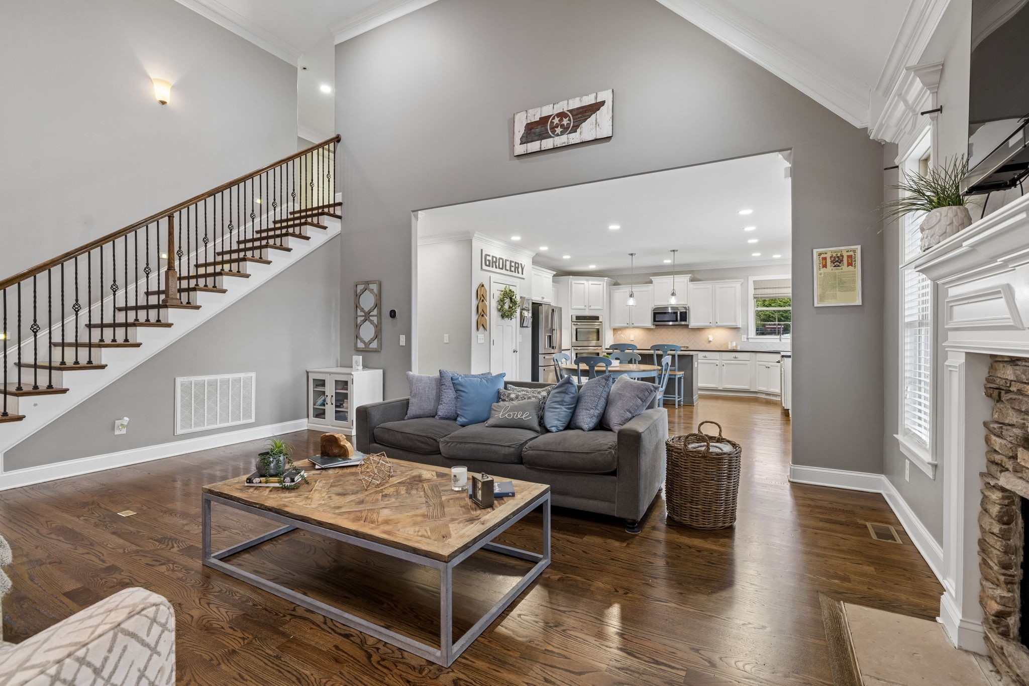 7005 Salmon Run Spring Hill, TN 37174 - Photo 23 of 85 a living room with furniture kitchen view and a wooden floor