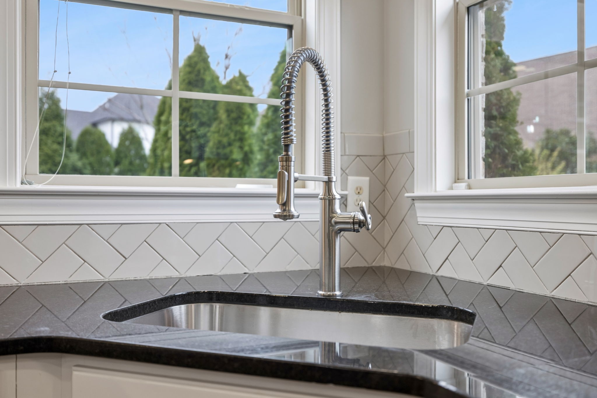 7005 Salmon Run Spring Hill, TN 37174 - Photo 41 of 85 a view of a sink a window and a kitchen view