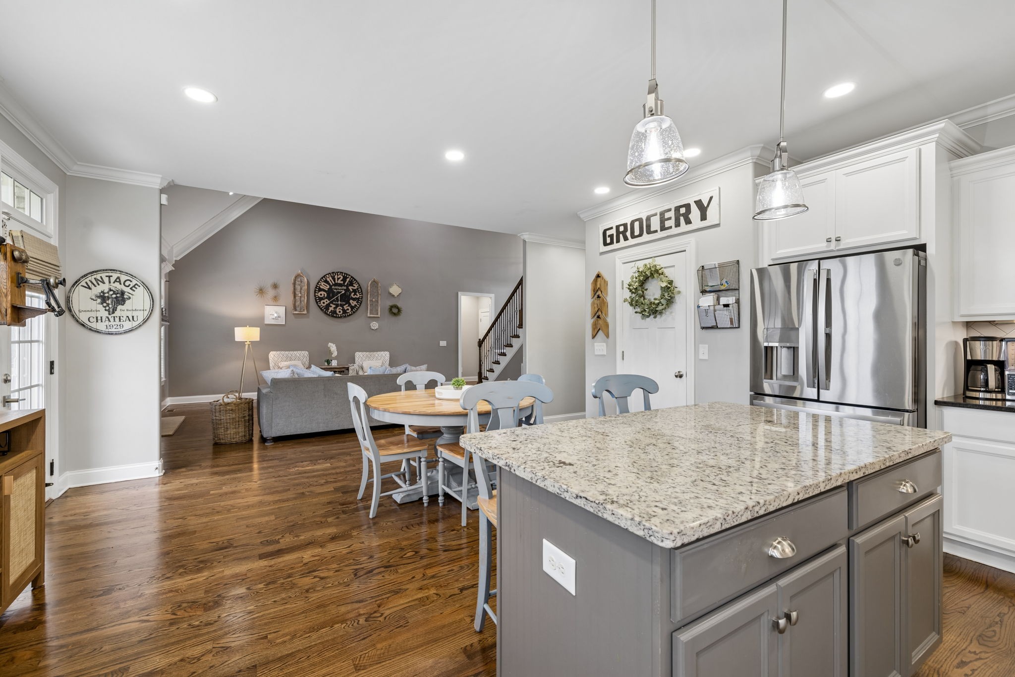 7005 Salmon Run Spring Hill, TN 37174 - Photo 43 of 85 a kitchen with a table and chairs in it