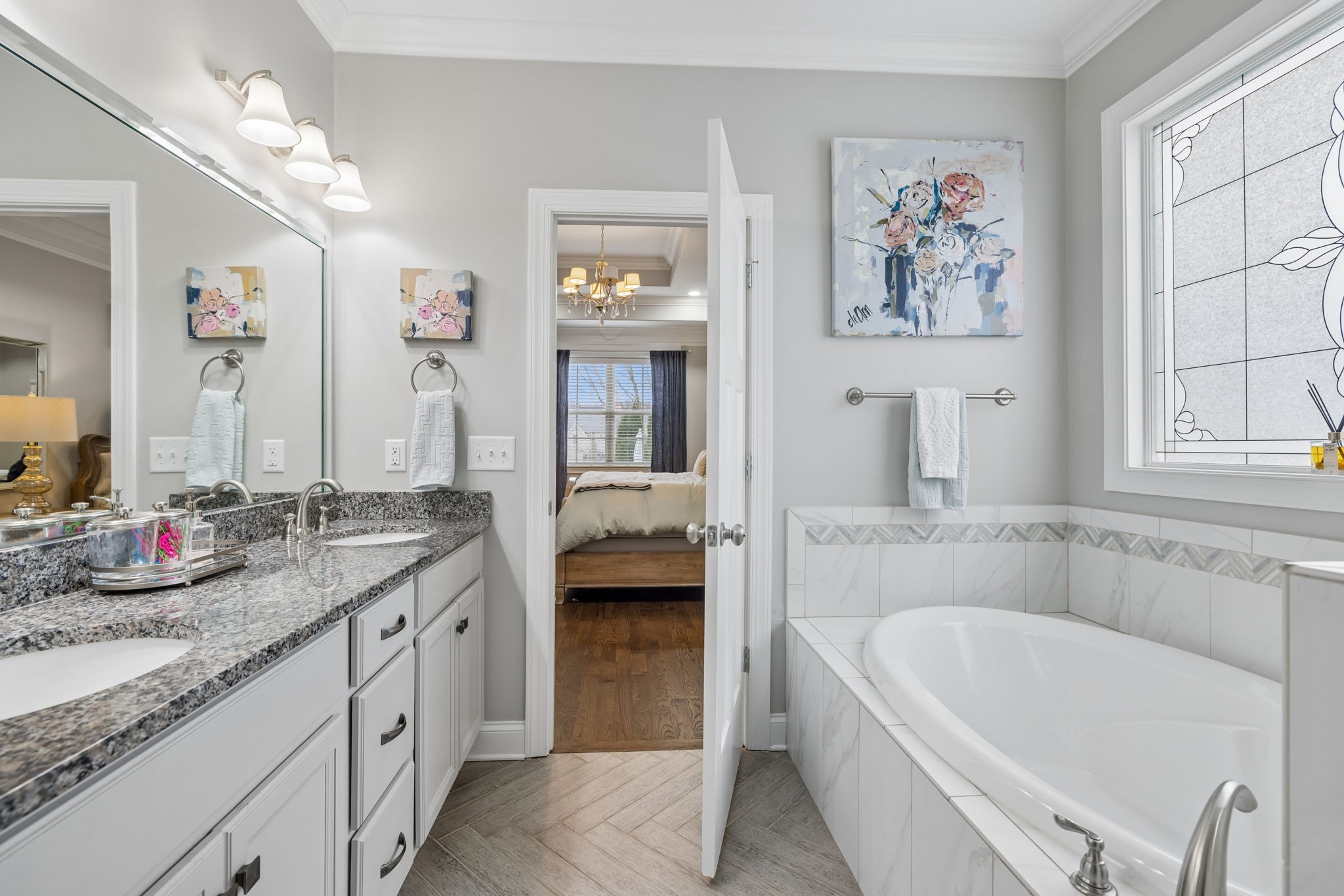7005 Salmon Run Spring Hill, TN 37174 - Photo 54 of 85 a bathroom with a granite countertop tub sink and mirror