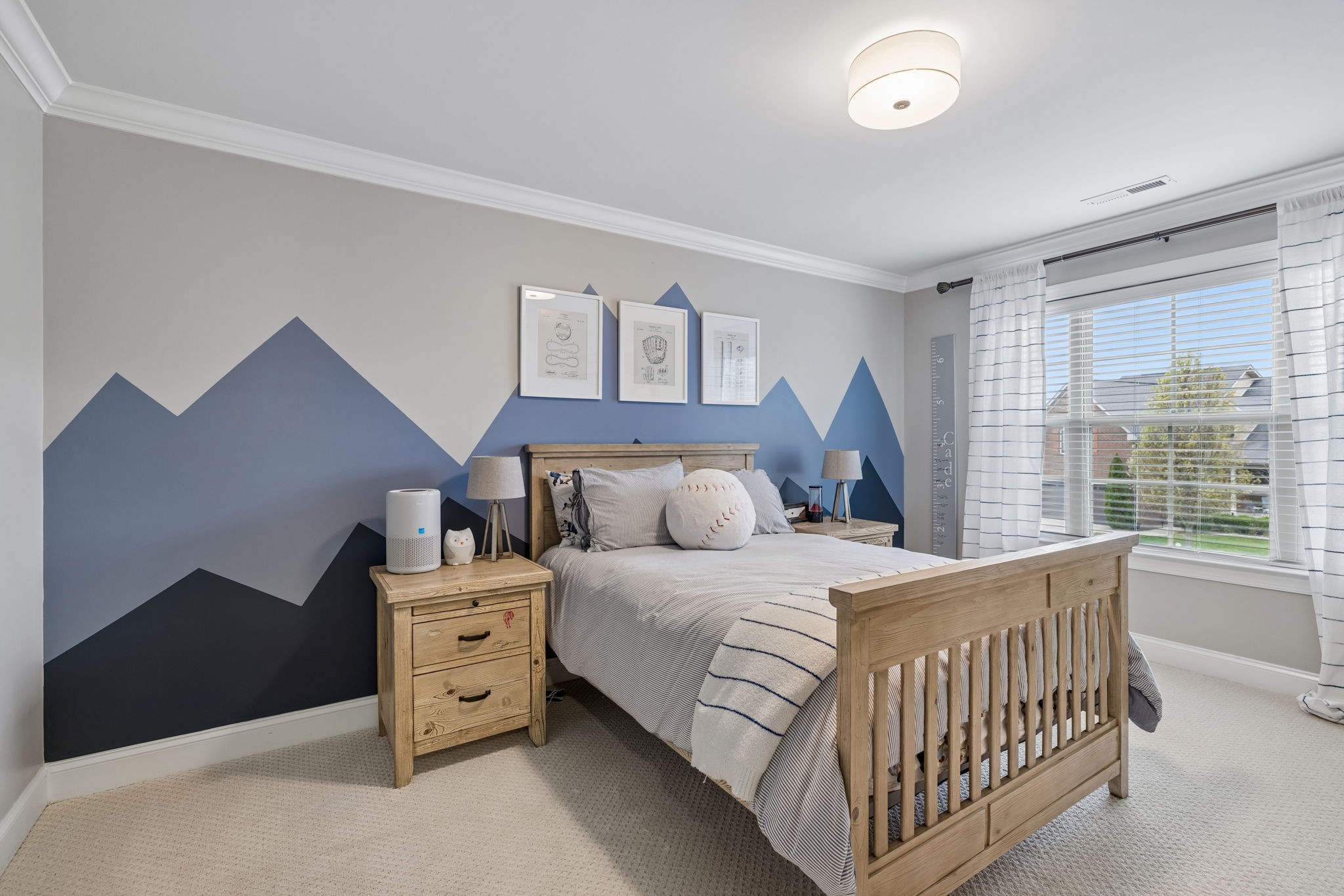 7005 Salmon Run Spring Hill, TN 37174 - Photo 61 of 85 a bedroom with a bed and a large window