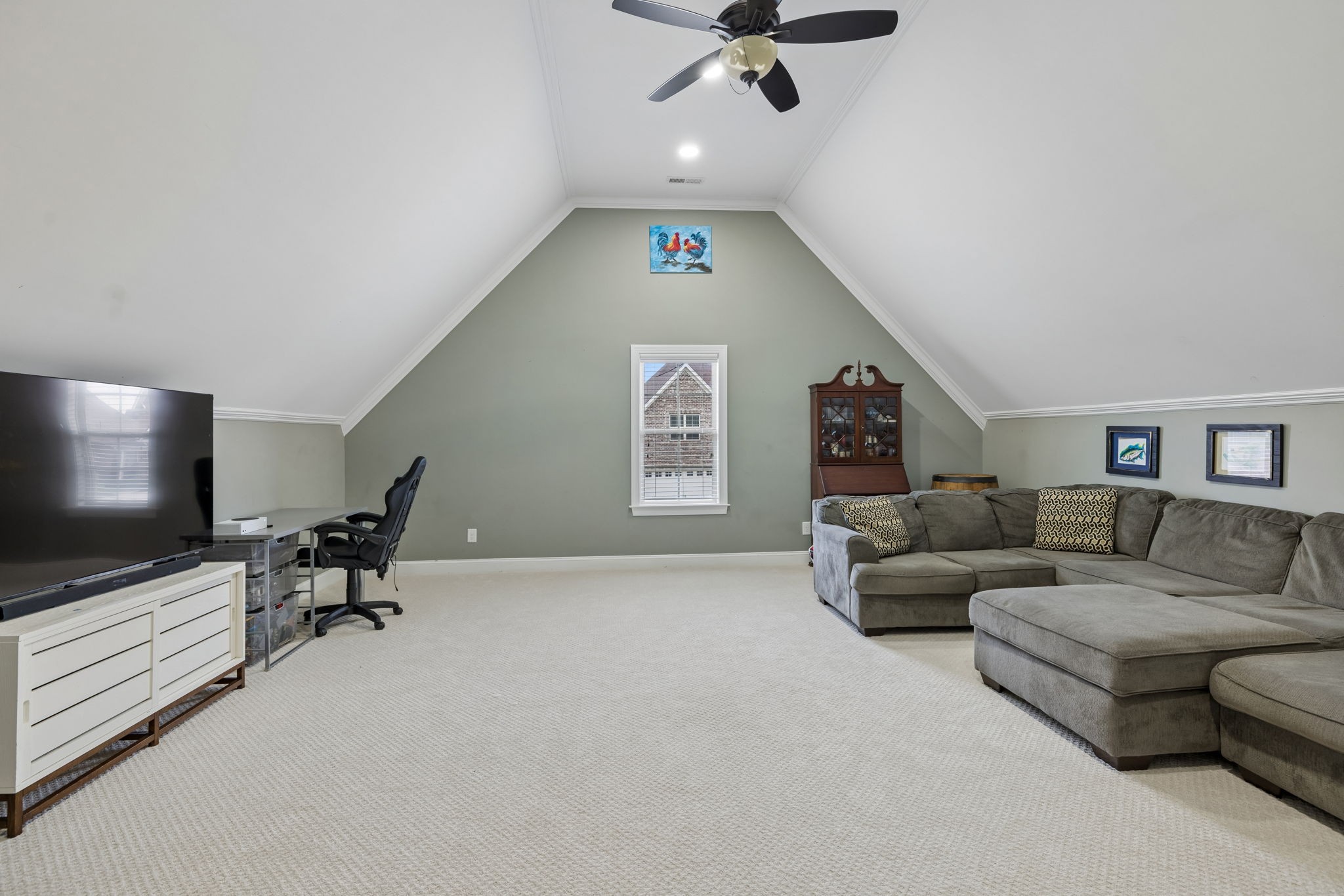 7005 Salmon Run Spring Hill, TN 37174 - Photo 63 of 85 a living room with furniture and a flat screen tv