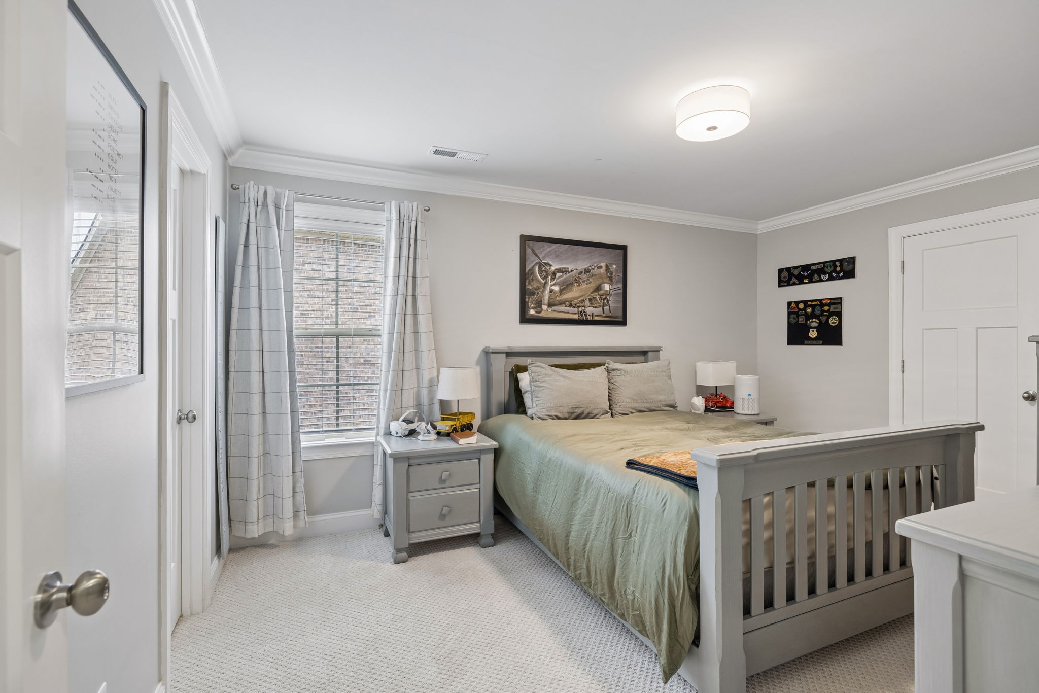 7005 Salmon Run Spring Hill, TN 37174 - Photo 69 of 85 a bedroom with a bed and a table