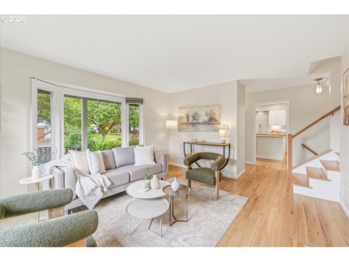 3130 Southwest 116th Avenue Beaverton, OR 97005 - Photo 19 of 44 a living room with furniture and a wooden floor