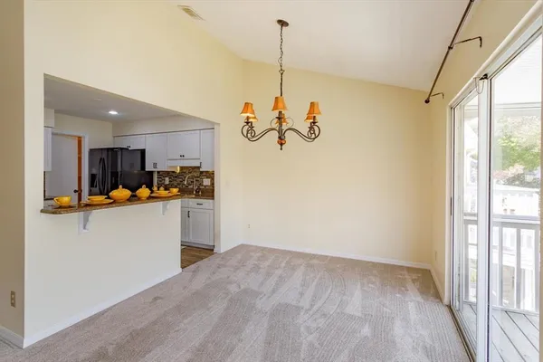 a view of a living room and a window